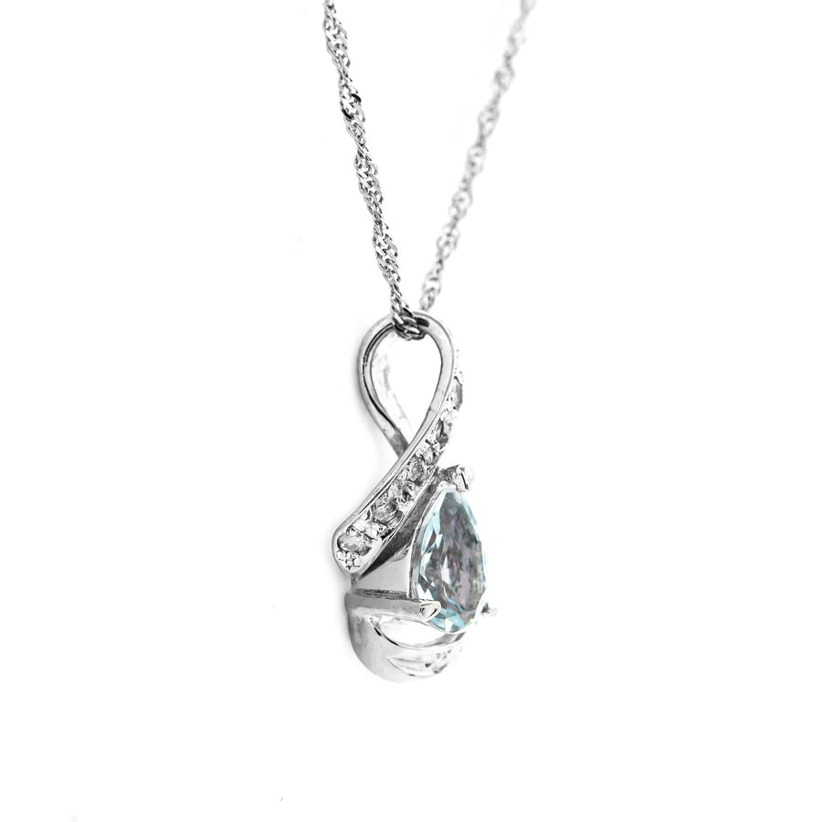 Collier pendentif en or blanc 18 carats et aigue-marine