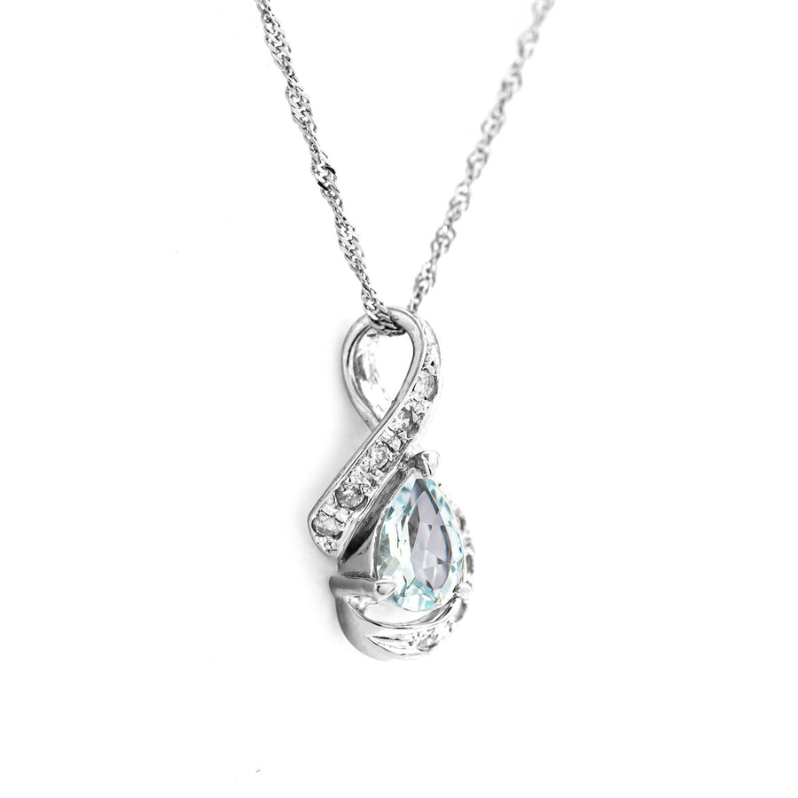 Collier pendentif en or blanc 18 carats et aigue-marine